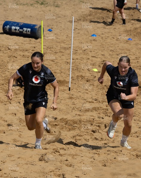 130625 Wales Women Rugby Squad Training at Merthyr Mawr dunes - Jasmine Joyce and Carys Cox during a training and conditioning session at Merthyr Mawr sand dunes