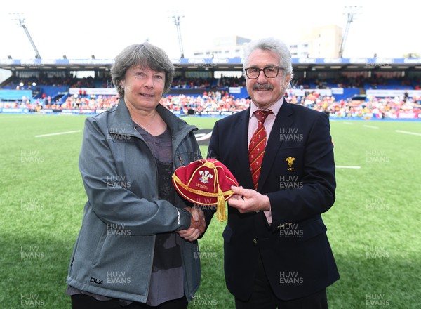 300422 - Wales Women v Italy Women - TikTok Women's Six Nations - Janet Gedrych receives her cap from WRU President Gerald Davies