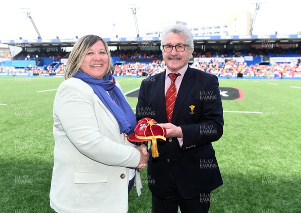 300422 - Wales Women v Italy Women - TikTok Women's Six Nations - Nadine Griffiths receives her cap from WRU President Gerald Davies