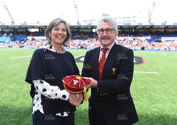 300422 - Wales Women v Italy Women - TikTok Women's Six Nations - Geraldine Baylis receives her cap from WRU President Gerald Davies