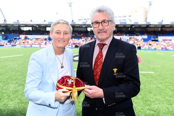 300422 - Wales Women v Italy Women - TikTok Women's Six Nations - Angela Haley receives her cap from WRU President Gerald Davies