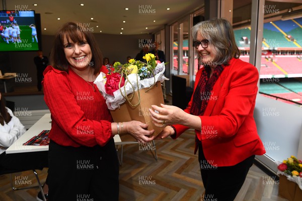300422 - Wales Women v Italy Women - TikTok Women's Six Nations - Catrin Davies receives flowers from Cilla Davies