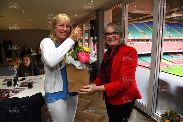 300422 - Wales Women v Italy Women - TikTok Women's Six Nations - Cath Evans receives flowers from Cilla Davies