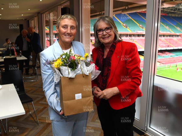 300422 - Wales Women v Italy Women - TikTok Women's Six Nations - Angela Haley receives flowers from Cilla Davies