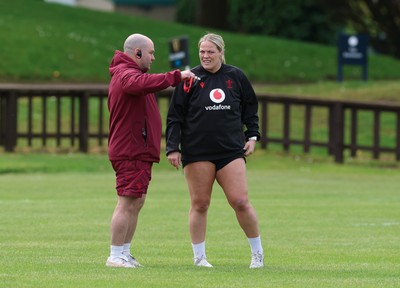 080526 - Wales Women Rugby Captains Run - Sean Lynn, Wales Women head coach with Kelsey Jones during Captains Run at Pirrie Park ahead of the Women’s 6 Nations match against Ireland at Affidea Stadium