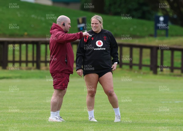 080526 - Wales Women Rugby Captains Run - Sean Lynn, Wales Women head coach with Kelsey Jones during Captains Run at Pirrie Park ahead of the Women’s 6 Nations match against Ireland at Affidea Stadium