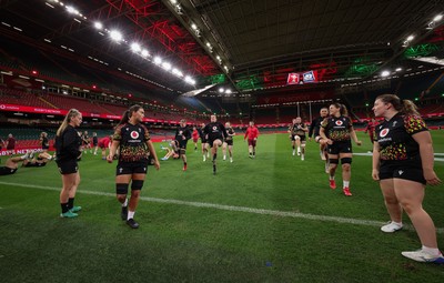 100426 - Wales Women Rugby Captain’s Run - The Wales match squad warm up during Captain’s Run at the Principality Stadium ahead of the opening Women’s 6 Nations match against Scotland