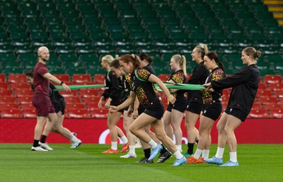 100426 - Wales Women Rugby Captain’s Run - The Wales match squad warm up during Captain’s Run at the Principality Stadium ahead of the opening Women’s 6 Nations match against Scotland