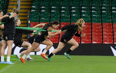 100426 - Wales Women Rugby Captain’s Run - The Wales match squad warm up during Captain’s Run at the Principality Stadium ahead of the opening Women’s 6 Nations match against Scotland