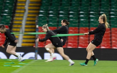 100426 - Wales Women Rugby Captain’s Run - The Wales match squad warm up during Captain’s Run at the Principality Stadium ahead of the opening Women’s 6 Nations match against Scotland