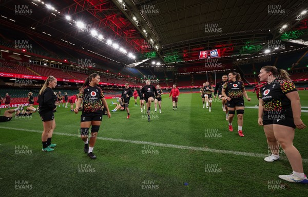 100426 - Wales Women Rugby Captain’s Run - The Wales match squad warm up during Captain’s Run at the Principality Stadium ahead of the opening Women’s 6 Nations match against Scotland