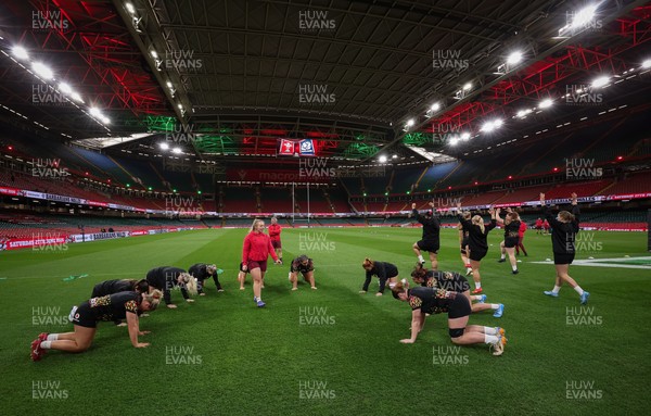 100426 - Wales Women Rugby Captain’s Run - The Wales match squad warm up during Captain’s Run at the Principality Stadium ahead of the opening Women’s 6 Nations match against Scotland
