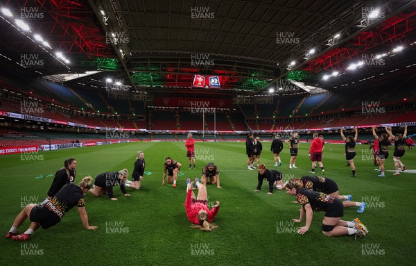 100426 - Wales Women Rugby Captain’s Run - The Wales match squad warm up during Captain’s Run at the Principality Stadium ahead of the opening Women’s 6 Nations match against Scotland