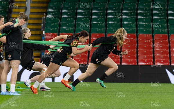 100426 - Wales Women Rugby Captain’s Run - The Wales match squad warm up during Captain’s Run at the Principality Stadium ahead of the opening Women’s 6 Nations match against Scotland