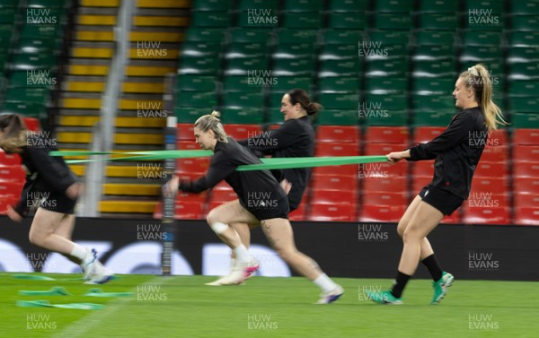 100426 - Wales Women Rugby Captain’s Run - The Wales match squad warm up during Captain’s Run at the Principality Stadium ahead of the opening Women’s 6 Nations match against Scotland