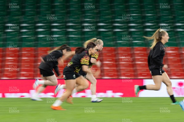 100426 - Wales Women Rugby Captain’s Run - The Wales match squad warm up during Captain’s Run at the Principality Stadium ahead of the opening Women’s 6 Nations match against Scotland