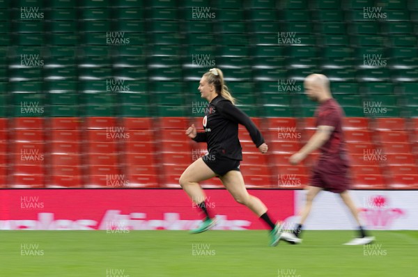 100426 - Wales Women Rugby Captain’s Run - The Wales match squad warm up during Captain’s Run at the Principality Stadium ahead of the opening Women’s 6 Nations match against Scotland