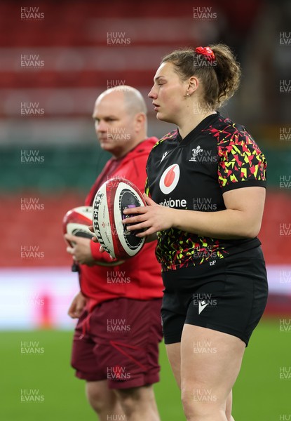 100426 - Wales Women Rugby Captain’s Run - Sean Lynn, Wales Women head coach with Gwenllian Pyrs during Captain’s Run at the Principality Stadium ahead of the opening Women’s 6 Nations match against Scotland
