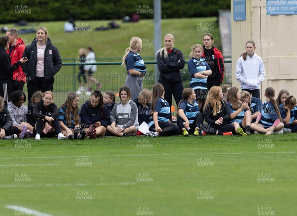 130922 - Wales Women Captains Run - Schoolchildren watch the Captains Run ahead of tWales Women World Cup warm up match against England