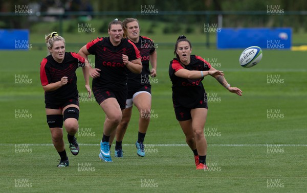 130922 - Wales Women Captains Run - Ffion Lewis of Wales feeds the ball out during the Captains Run ahead of Wales Women’s World Cup warm up match against England