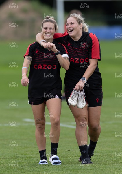 130922 - Wales Women Captains Run - Keira Bevan of Wales and Kelsey Jones of Wales during the Captains Run ahead of Wales Women’s World Cup warm up match against England
