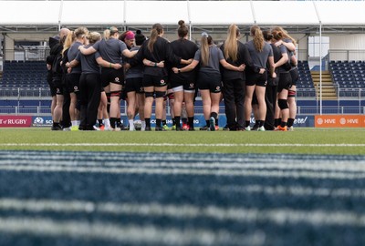 210325  Wales Women Rugby Captain’s Run - The Wales Women’s Squad huddle up during Captain’s Run at The Hive Stadium Edinburgh ahead of the opening match of the Women’s 6 Nations against Scotland