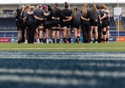 210325  Wales Women Rugby Captain’s Run - The Wales Women’s Squad huddle up during Captain’s Run at The Hive Stadium Edinburgh ahead of the opening match of the Women’s 6 Nations against Scotland