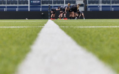 210325  Wales Women Rugby Captain’s Run - Georgia Evans breaks during Captain’s Run at The Hive Stadium Edinburgh ahead of the opening match of the Women’s 6 Nations against Scotland