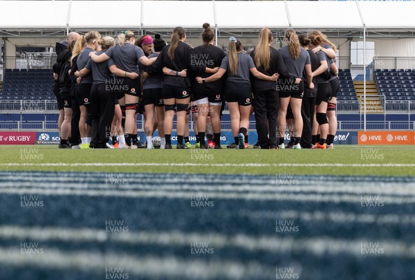 210325  Wales Women Rugby Captain’s Run - The Wales Women’s Squad huddle up during Captain’s Run at The Hive Stadium Edinburgh ahead of the opening match of the Women’s 6 Nations against Scotland