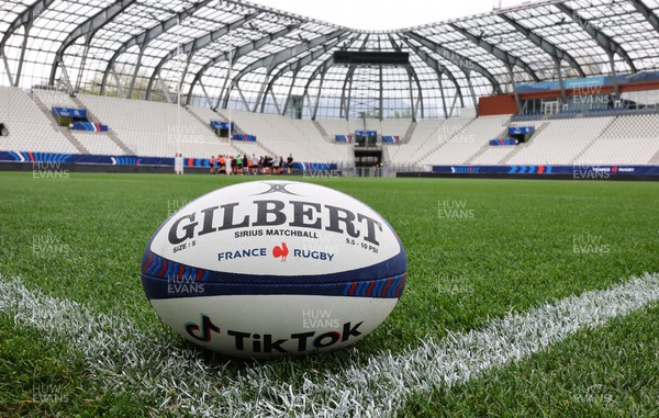 220423 - Wales Women Rugby Captains Run - A match ball at the Stade des Alpes in Grenoble ahead of the TicTok Women’s 6 Nations match against France