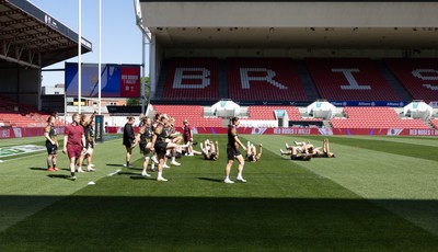 240426 - Wales Women’s Rugby Captain’s Run - Wales warm up during Captain’s Run at Ashton Gate, ahead of the Women’s 6 Nations match against England