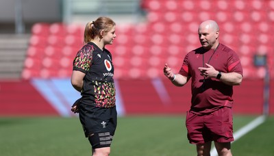 240426 - Wales Women’s Rugby Captain’s Run - Sean Lynn, Wales Women head coach and Bethan Lewis during Captain’s Run at Ashton Gate, ahead of the Women’s 6 Nations match against England