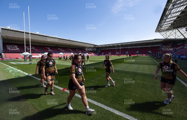240426 - Wales Women’s Rugby Captain’s Run - Wales warm up during Captain’s Run at Ashton Gate, ahead of the Women’s 6 Nations match against England