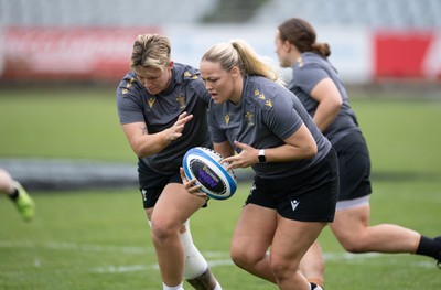 260425 - Wales Women Captains Run - Kelsey Jones and Donna Rose during Captains Run ahead of Wales’ final Guinness Women’s Six Nations match against Italy