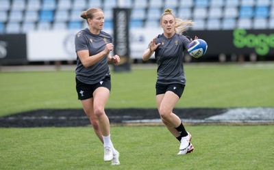 260425 - Wales Women Captains Run - Carys Cox and Hannah Jones during Captains Run ahead of Wales’ final Guinness Women’s Six Nations match against Italy