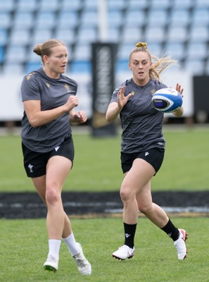 260425 - Wales Women Captains Run - Carys Cox and Hannah Jones during Captains Run ahead of Wales’ final Guinness Women’s Six Nations match against Italy