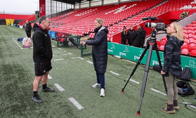 120424 - Wales Women Rugby Walkthrough - Shaun Connor, Wales Women attack coach, is interviewed by BBC Wales during Captain’s Walkthrough and kickers session at Virgin Media Park, Cork, ahead of Wales’ Women’s 6 Nations match against Ireland