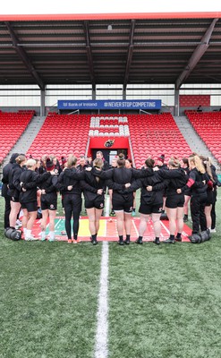 120424 - Wales Women Rugby Walkthrough - Ioan Cunningham, Wales Women head coach, speak to the players during Captain’s Walkthrough and kickers session at Virgin Media Park, Cork, ahead of Wales’ Women’s 6 Nations match against Ireland