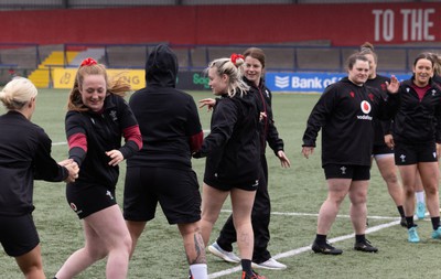 120424 - Wales Women Rugby Walkthrough - The Wales team go through some warm up games during Captain’s Walkthrough and kickers session at Virgin Media Park, Cork, ahead of Wales’ Women’s 6 Nations match against Ireland