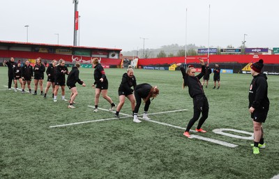 120424 - Wales Women Rugby Walkthrough - The Wales team go through some warm up games during Captain’s Walkthrough and kickers session at Virgin Media Park, Cork, ahead of Wales’ Women’s 6 Nations match against Ireland