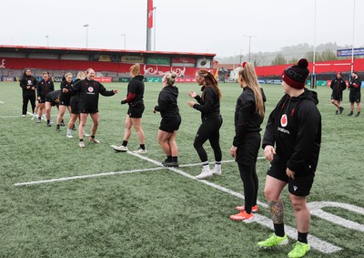 120424 - Wales Women Rugby Walkthrough - The Wales team go through some warm up games during Captain’s Walkthrough and kickers session at Virgin Media Park, Cork, ahead of Wales’ Women’s 6 Nations match against Ireland