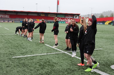 120424 - Wales Women Rugby Walkthrough - The Wales team go through some warm up games during Captain’s Walkthrough and kickers session at Virgin Media Park, Cork, ahead of Wales’ Women’s 6 Nations match against Ireland