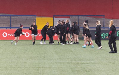 120424 - Wales Women Rugby Walkthrough - The Wales team walk through a session during Captain’s Walkthrough and kickers session at Virgin Media Park, Cork, ahead of Wales’ Women’s 6 Nations match against Ireland