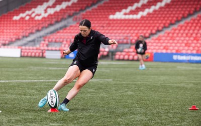 120424 - Wales Women Rugby Walkthrough - Sian Jones during the kickers session at Virgin Media Park, Cork, ahead of Wales’ Women’s 6 Nations match against Ireland