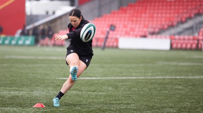 120424 - Wales Women Rugby Walkthrough - Sian Jones during the kickers session at Virgin Media Park, Cork, ahead of Wales’ Women’s 6 Nations match against Ireland