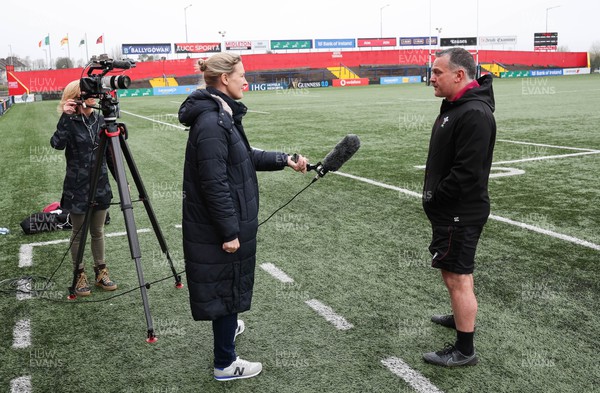 120424 - Wales Women Rugby Walkthrough - Shaun Connor, Wales Women attack coach, is interviewed by BBC Wales during Captain’s Walkthrough and kickers session at Virgin Media Park, Cork, ahead of Wales’ Women’s 6 Nations match against Ireland