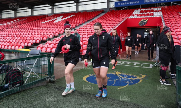 120424 - Wales Women Rugby Walkthrough - Keira Bevan and Lleucu George walk out during Captain’s Walkthrough and kickers session at Virgin Media Park, Cork, ahead of Wales’ Women’s 6 Nations match against Ireland