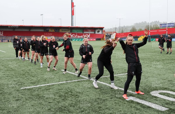 120424 - Wales Women Rugby Walkthrough - The Wales team go through some warm up games during Captain’s Walkthrough and kickers session at Virgin Media Park, Cork, ahead of Wales’ Women’s 6 Nations match against Ireland