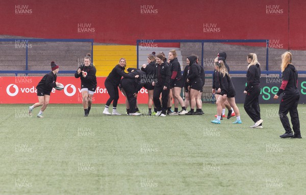 120424 - Wales Women Rugby Walkthrough - The Wales team walk through a session during Captain’s Walkthrough and kickers session at Virgin Media Park, Cork, ahead of Wales’ Women’s 6 Nations match against Ireland