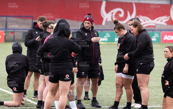 120424 - Wales Women Rugby Walkthrough - Mike Hill, Wales Women forwards coach, oversees scrummaging during Captain’s Walkthrough and kickers session at Virgin Media Park, Cork, ahead of Wales’ Women’s 6 Nations match against Ireland